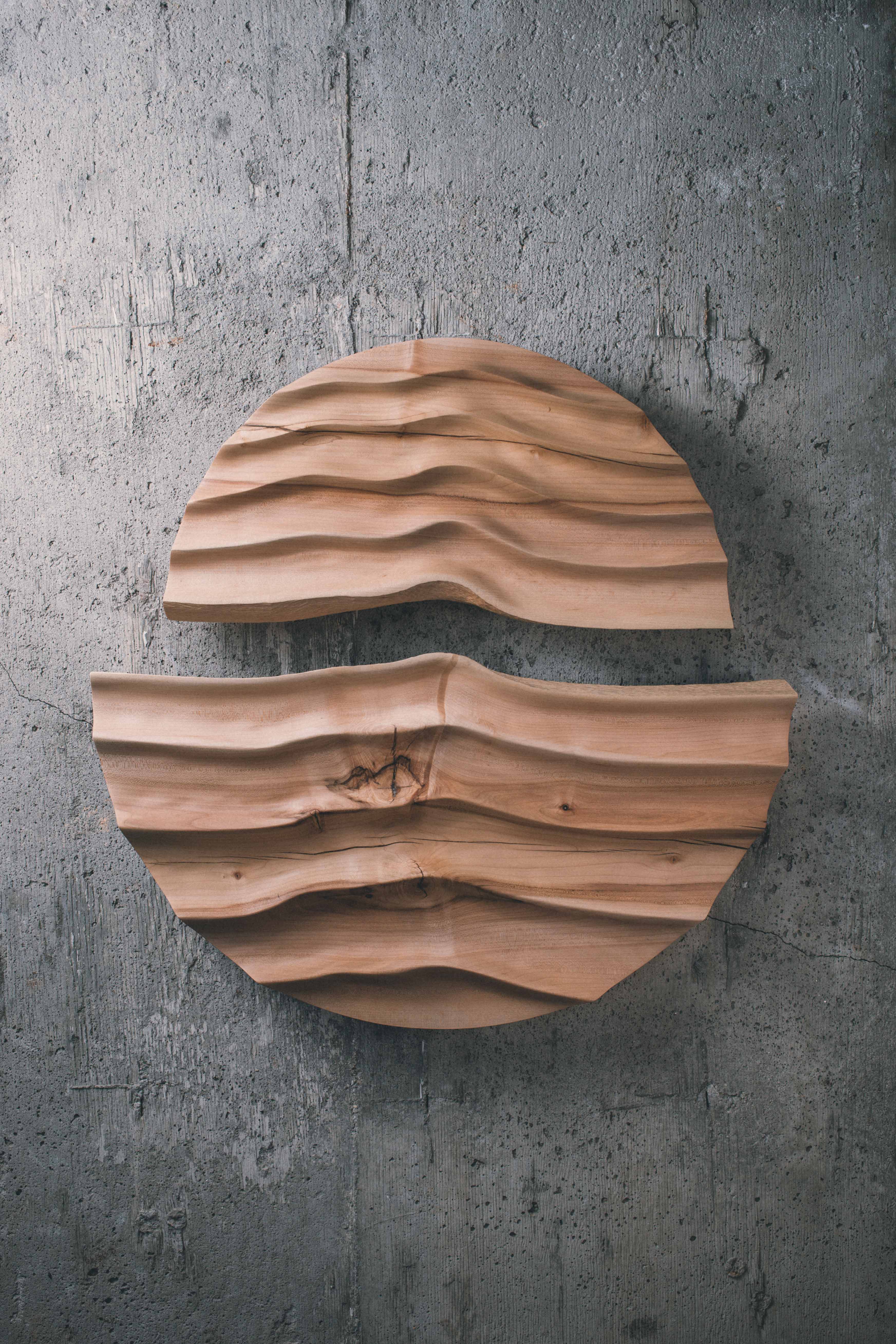 Smooth hand sculpted wall art made from salvaged Maple wood. A two-piece wall hanging in a circular shape.